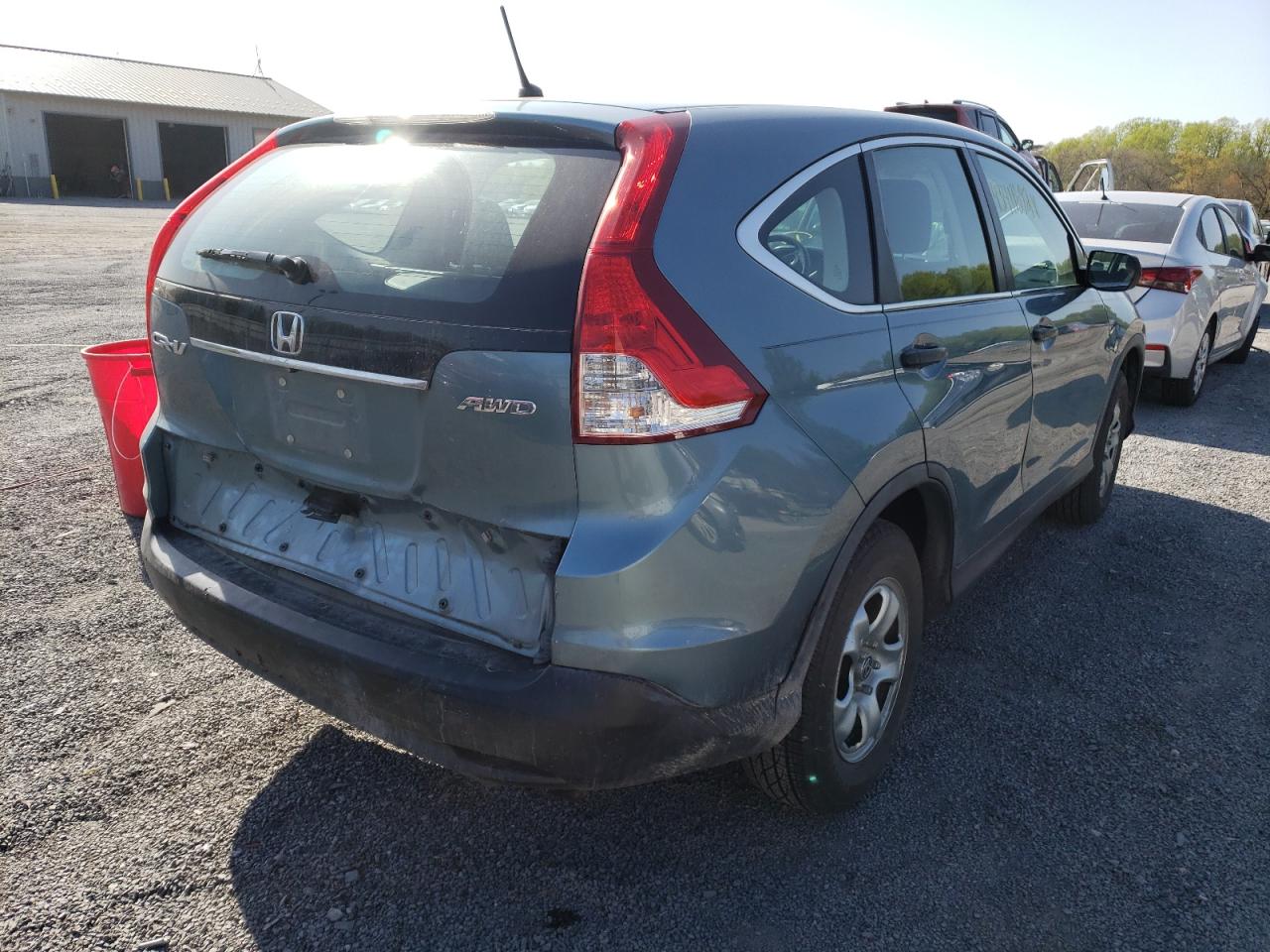 Photo 4 from auction – 2013 HONDA CR-V LX with VIN 5J6RM4H30DL054785
