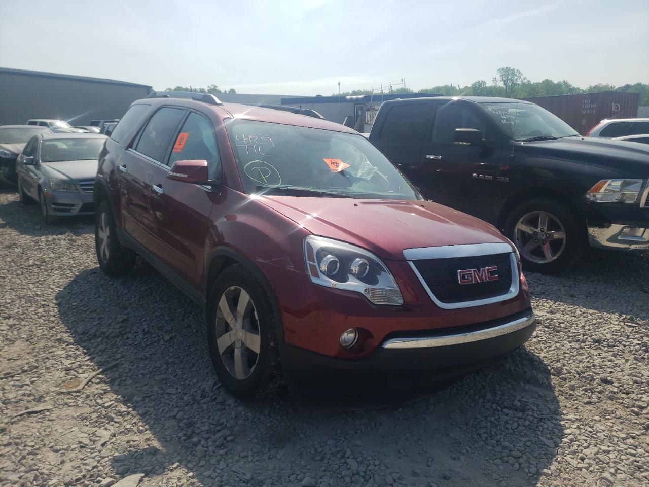GMC ACADIA SLT 2011 with VIN 1GKKRRED8BJ280878 - Photo from auction