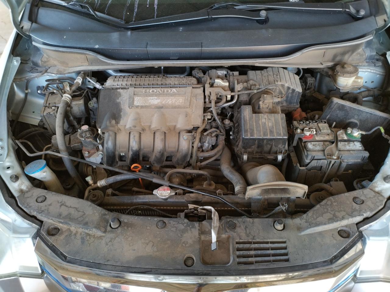 Photo 7 from auction – 2013 HONDA INSIGHT LX with VIN JHMZE2H50DS006684