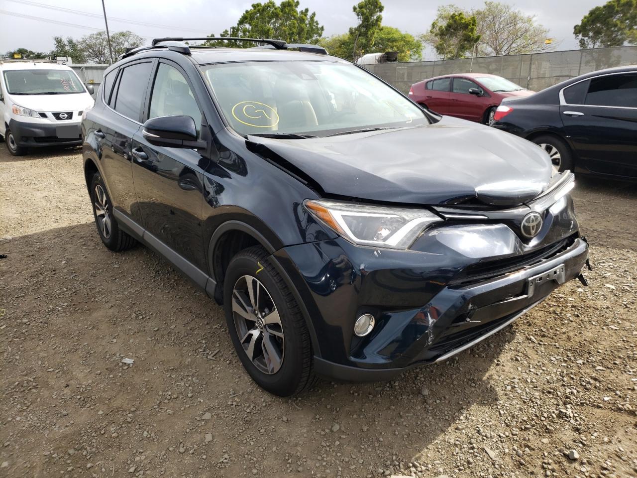 TOYOTA RAV4 XLE 2017 with VIN JTMWFREV3HD102785 - Photo from auction