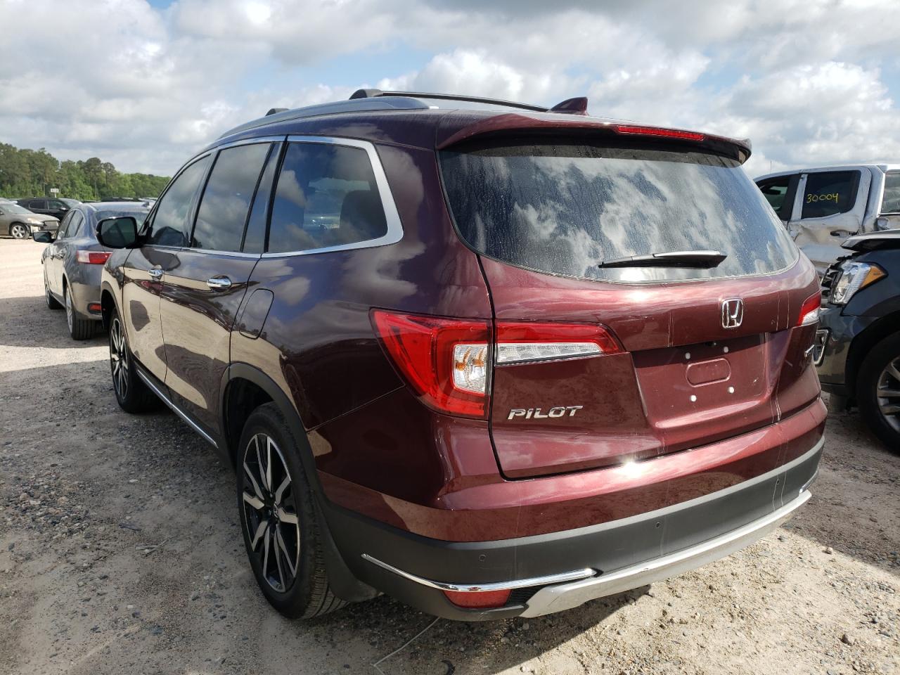 Photo 3 from auction – 2021 HONDA PILOT TOUR with VIN 5FNYF5H62MB032995