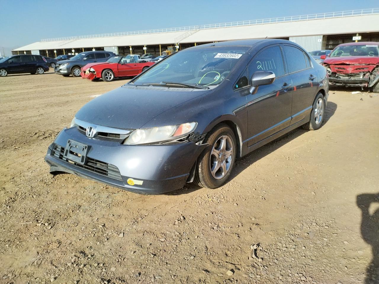 Photo 2 from auction – 2006 HONDA CIVIC HYBR with VIN JHMFA36216S013448