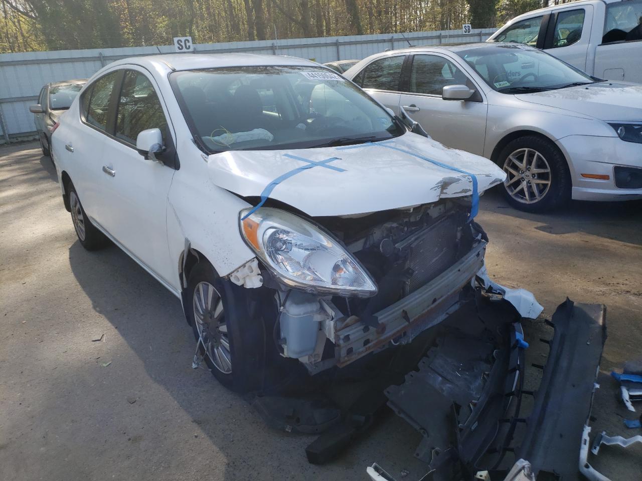NISSAN VERSA S 2012 with VIN 3N1CN7AP9CL865711 - Photo from auction