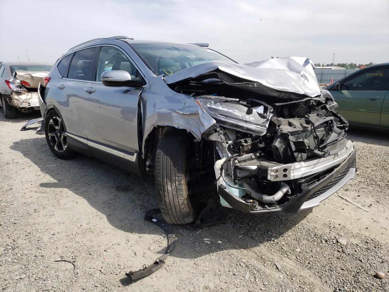 HONDA CR-V TOURI 2018 with VIN 7FARW2H95JE034981 - Photo from auction