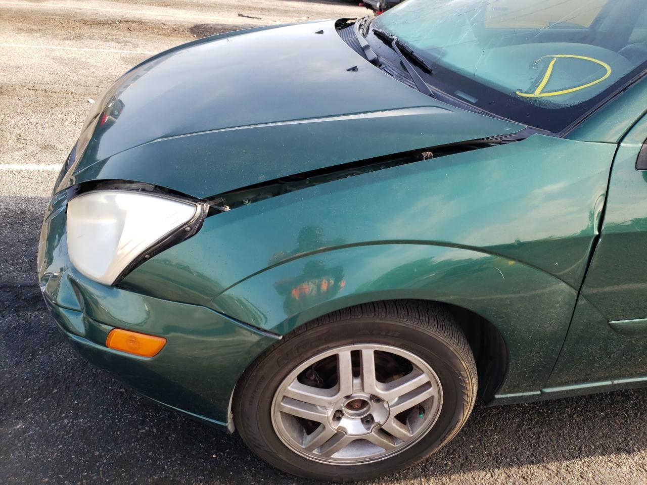 Photo 9 from auction – 2000 FORD FOCUS SE with VIN 1FAFP34P4YW289798