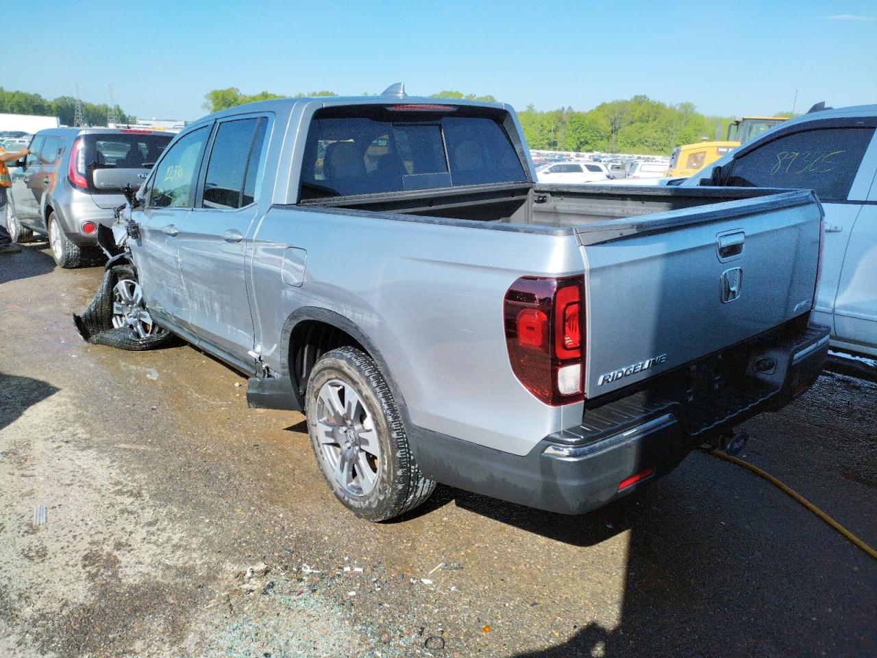 Photo 3 from auction – 2019 HONDA RIDGELINE with VIN 5FPYK3F50KB041015