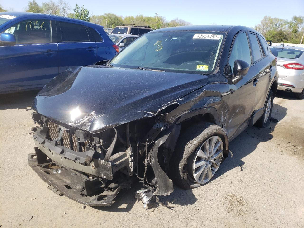 Photo 2 from auction – 2014 MAZDA CX-5 TOURI with VIN JM3KE4CY0E0427969