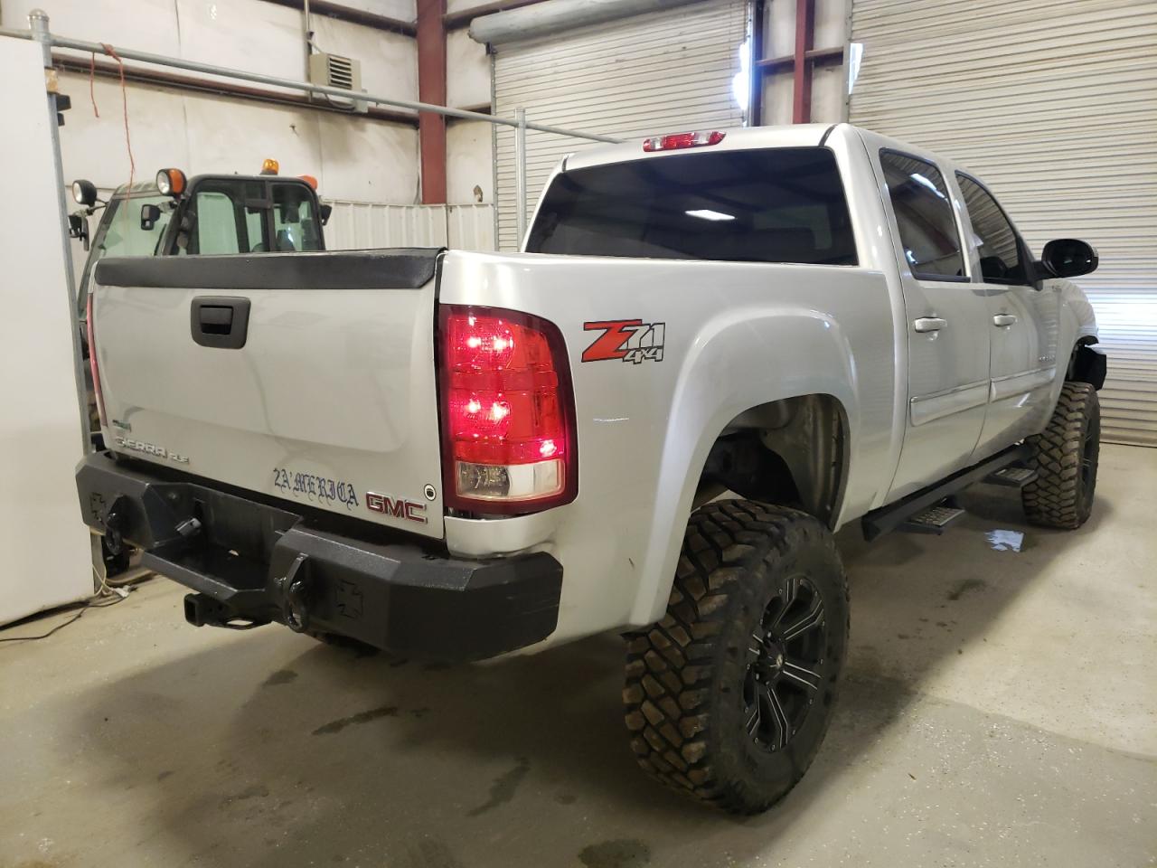 Photo 4 from auction – 2011 GMC SIERRA K15 with VIN 3GTP2VE35BG257467
