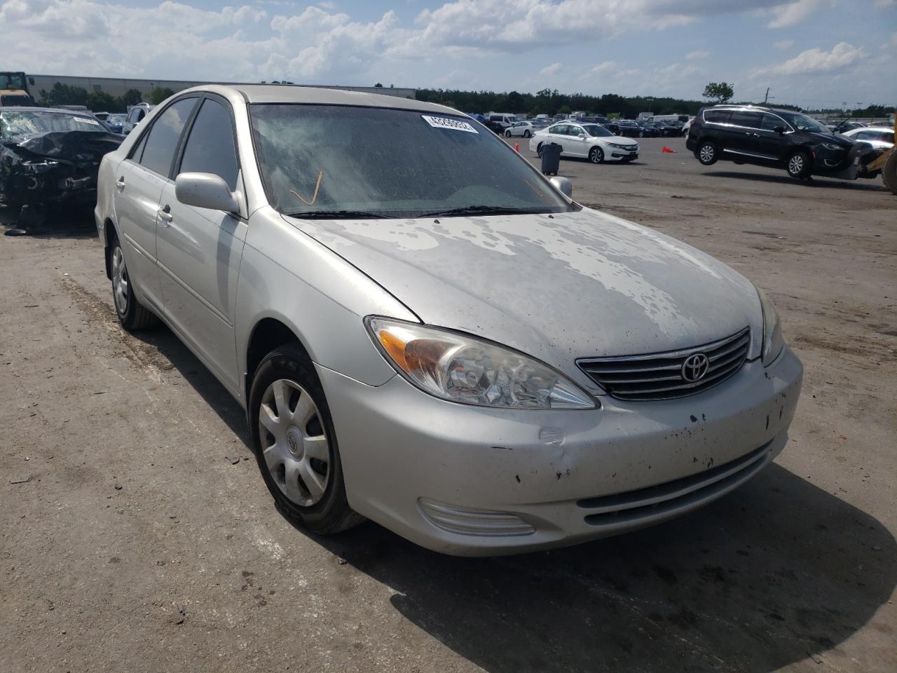 TOYOTA CAMRY LE 2003 with VIN 4T1BE32KX3U206607 - Photo from auction