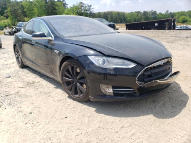 TESLA MODEL S 2014 with VIN 5YJSA1H15EFP66243 - Photo from auction