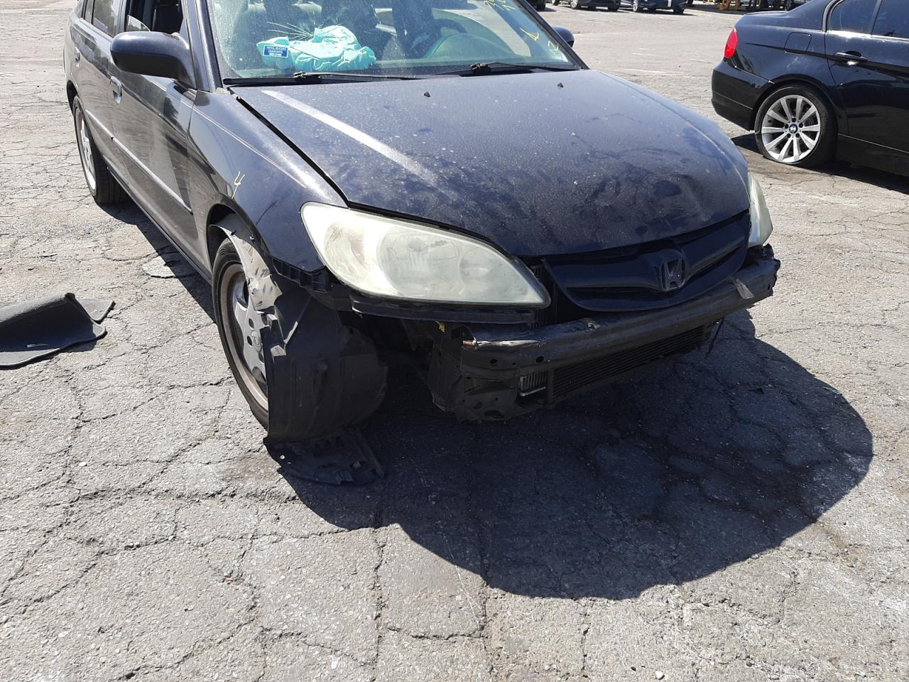 Photo 9 from auction – 2005 HONDA CIVIC LX with VIN 2HGES16535H581748