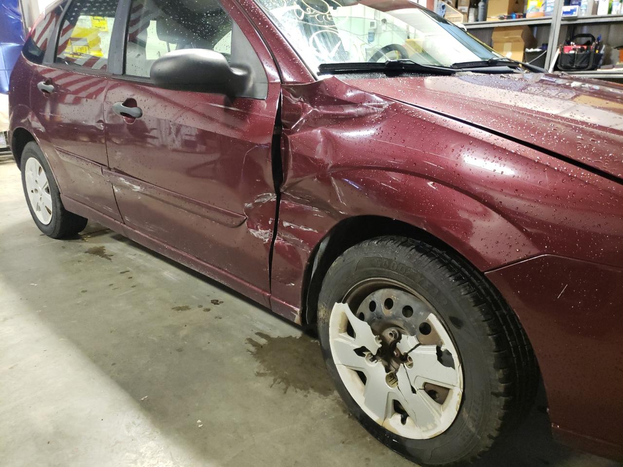 Photo 9 from auction – 2007 FORD FOCUS SE with VIN 1FAFP37N87W128525