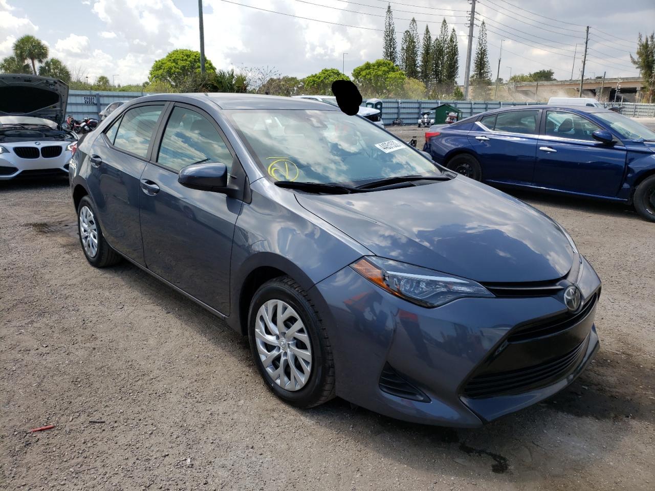 TOYOTA COROLLA L 2019 with VIN 5YFBURHE2KP941539 - Photo from auction