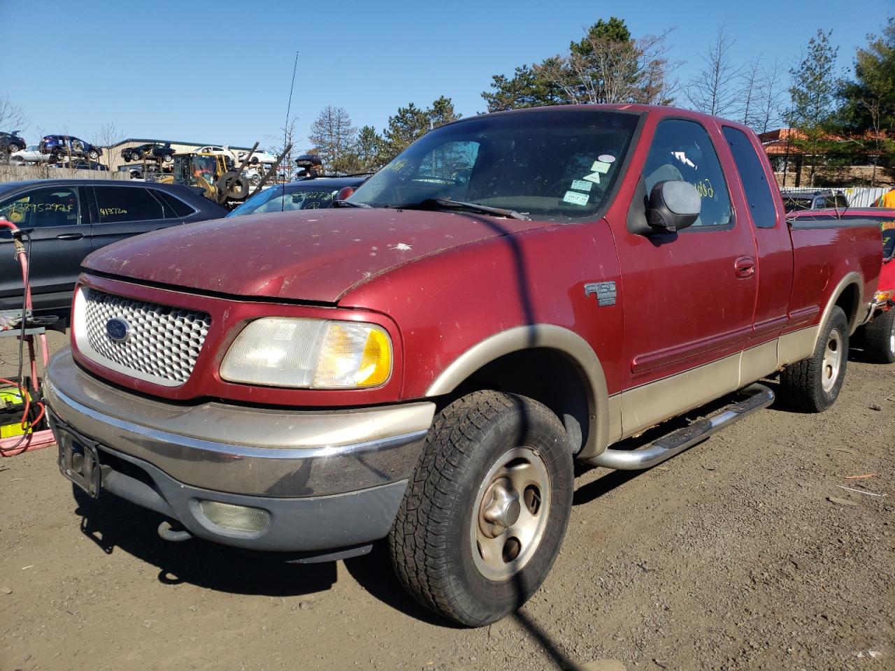 Photo 2 from auction – 1999 FORD F150 with VIN 1FTRX18W9XNA09908