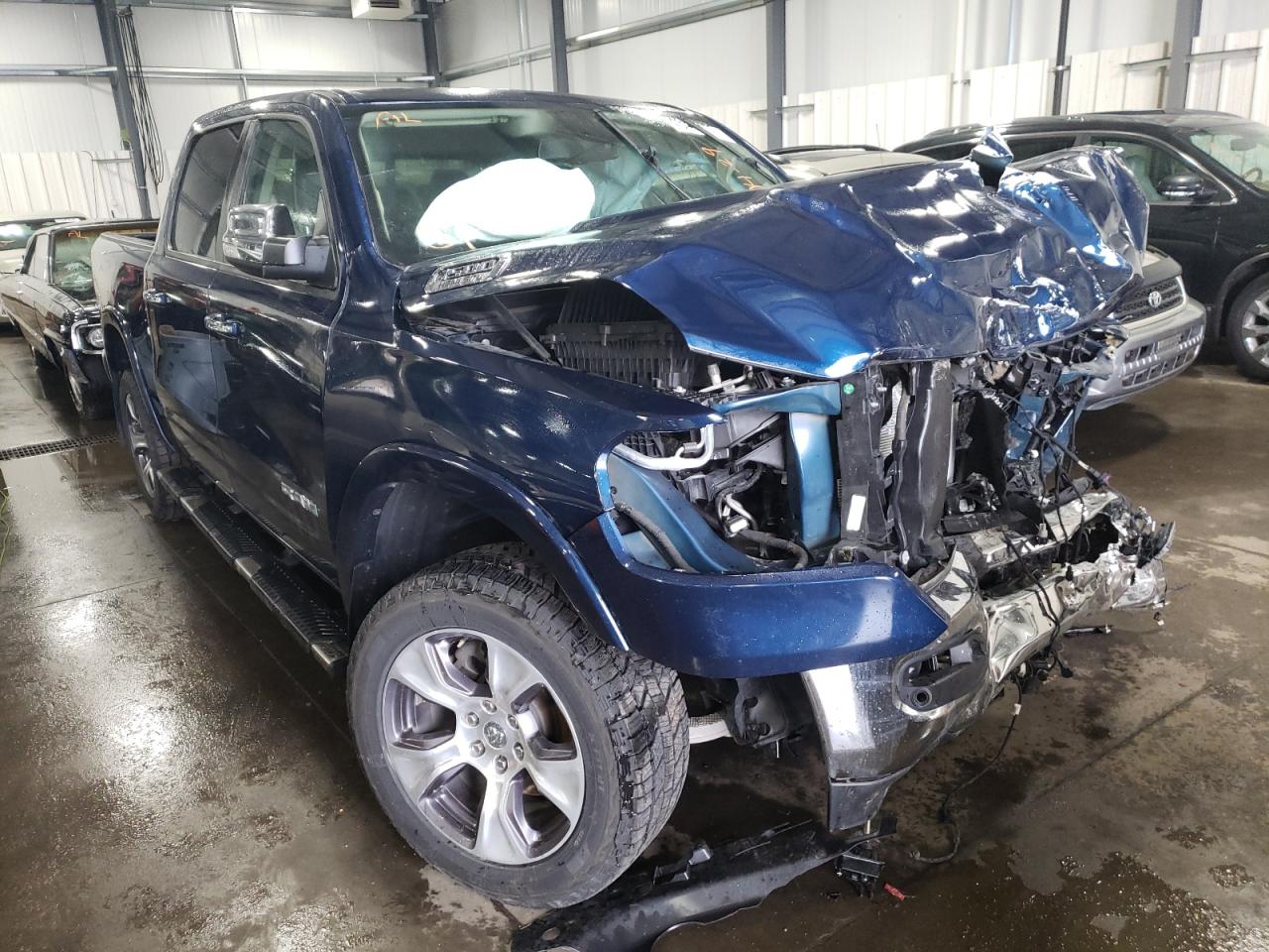 RAM 1500 LARAM 2019 with VIN 1C6SRFJT8KN677899 - Photo from auction