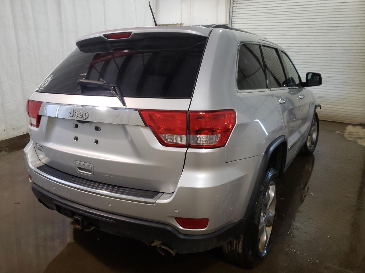 Photo 4 from auction – 2013 JEEP GRAND CHER with VIN 1C4RJFBT2DC573694
