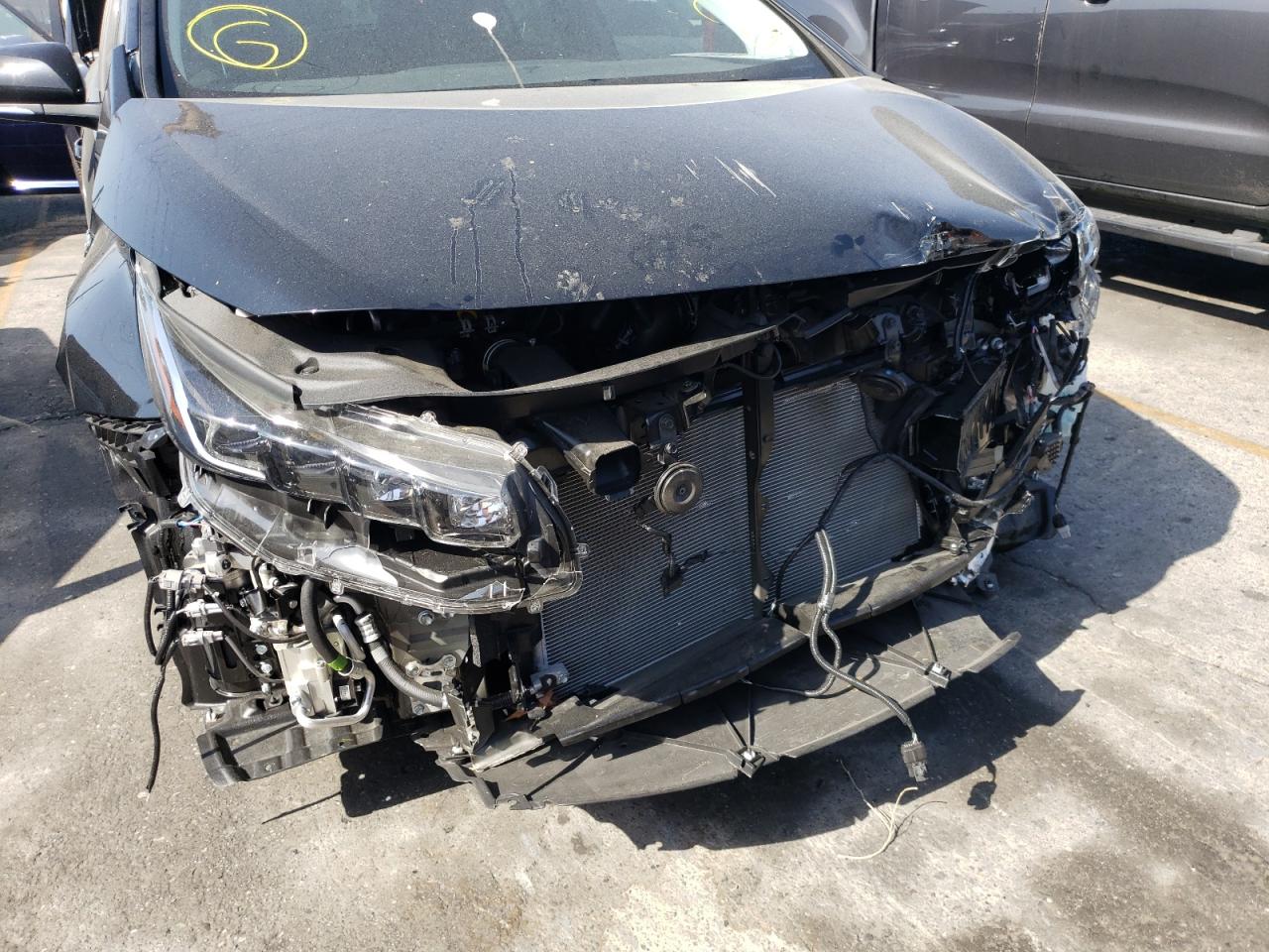 Photo 9 from auction – 2022 TOYOTA PRIUS PRIM with VIN JTDKAMFP3N3202273