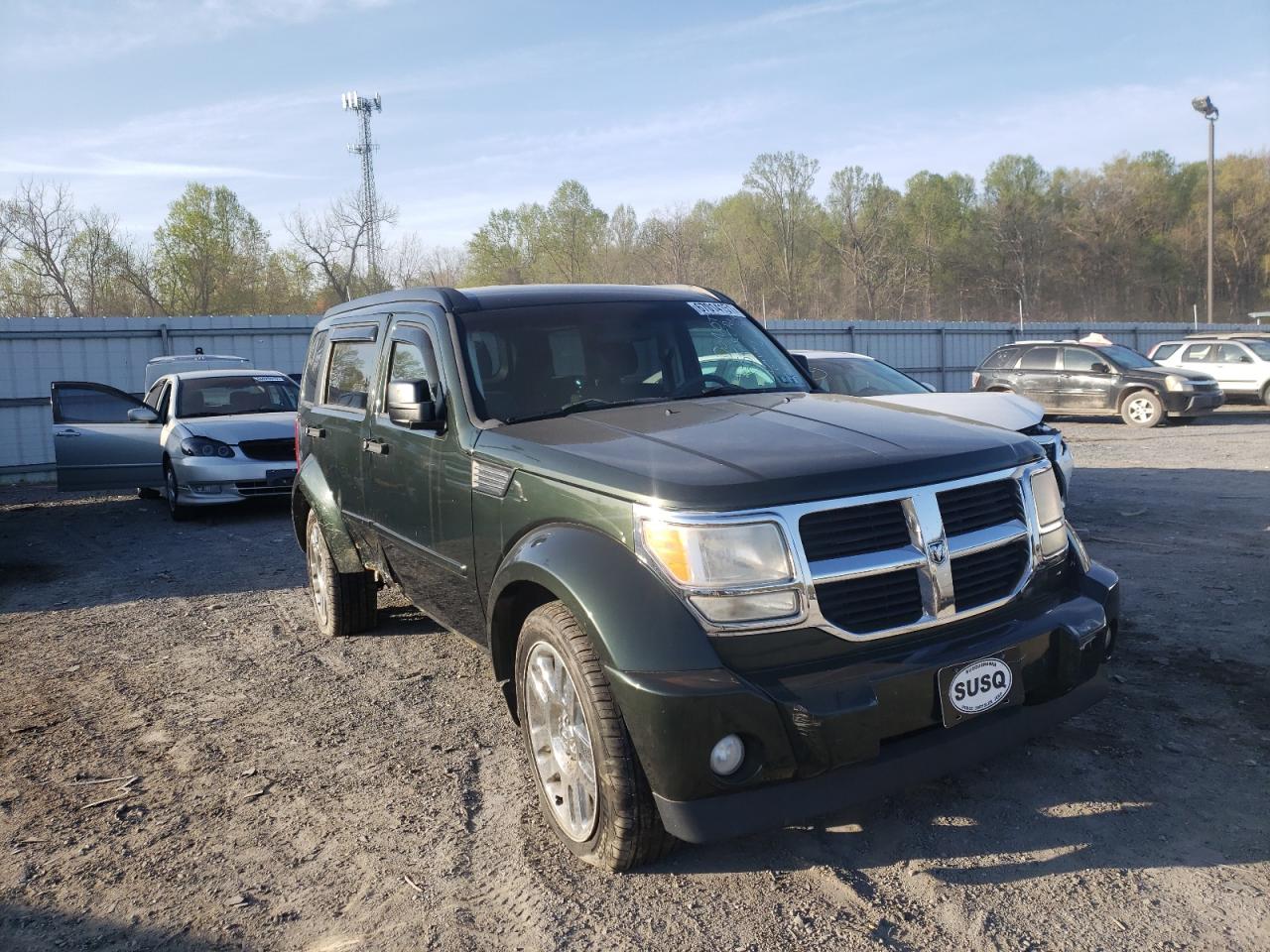 DODGE NITRO SE 2010 with VIN 1D4PU2GK0AW140198 - Photo from auction
