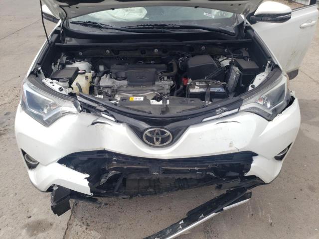 Photo 7 from auction – 2017 TOYOTA RAV4 XLE with VIN JTMRFREV0HD208155