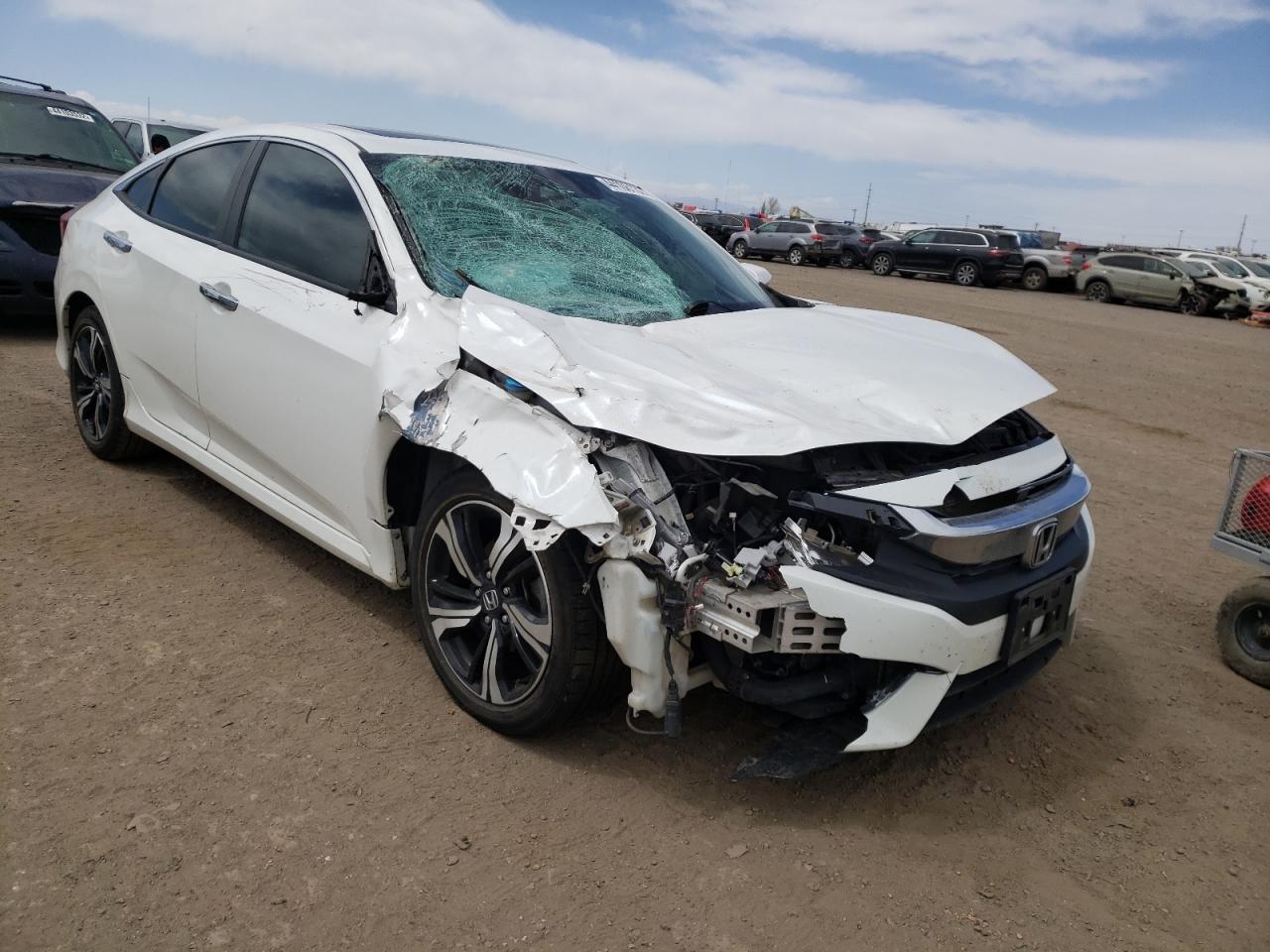 Photo 1 from auction – 2017 HONDA CIVIC TOUR with VIN 19XFC1F91HE025344