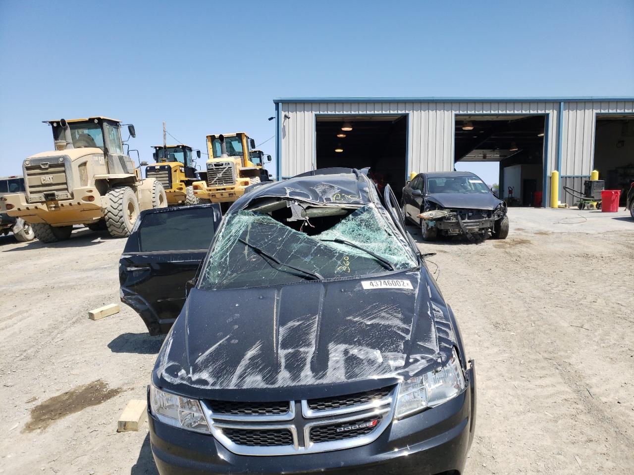 Photo 9 from auction – 2015 DODGE JOURNEY SE with VIN 3C4PDCAB1FT665201
