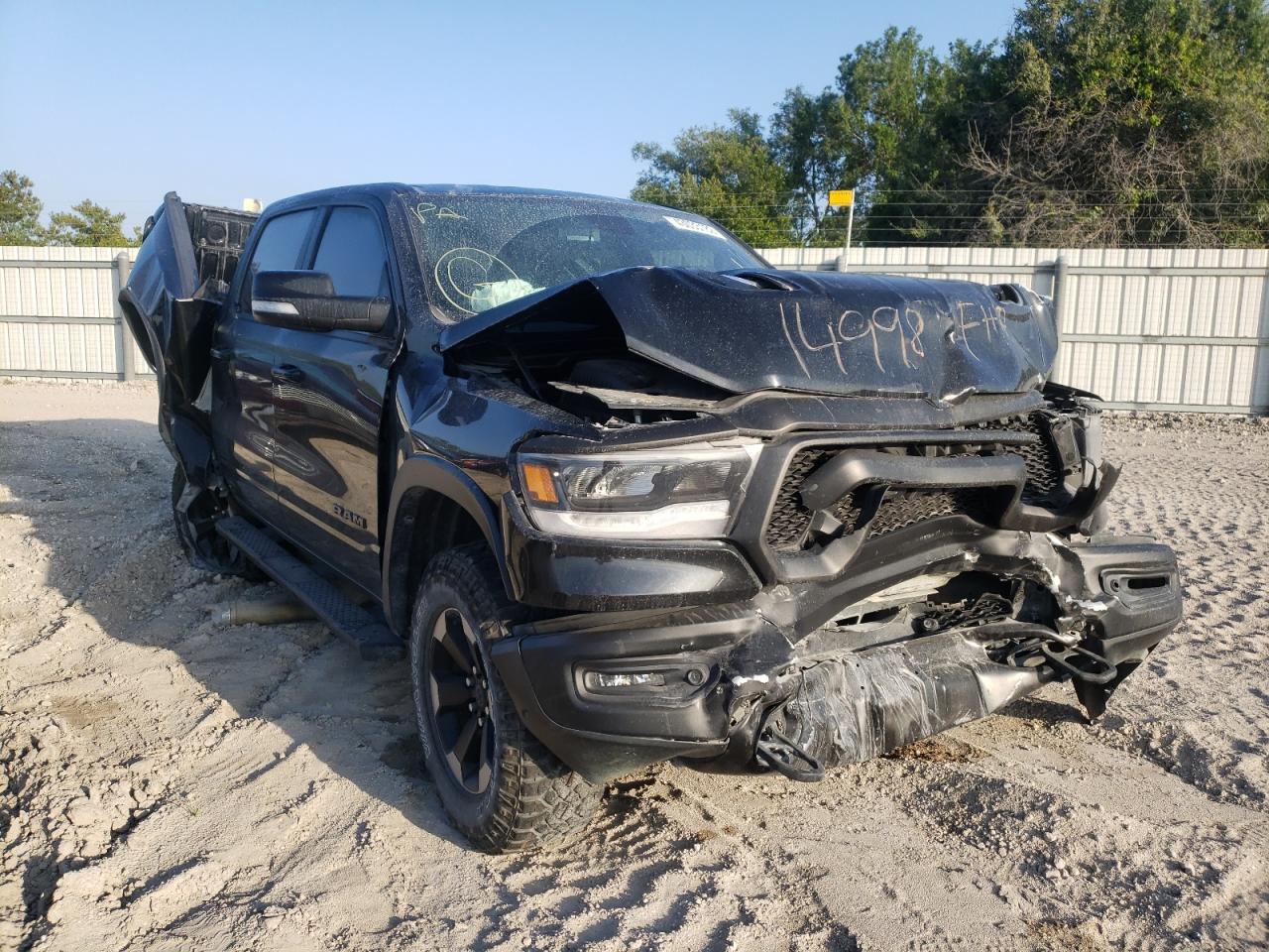 RAM 1500 REBEL 2019 with VIN 1C6SRFLT3KN670985 - Photo from auction