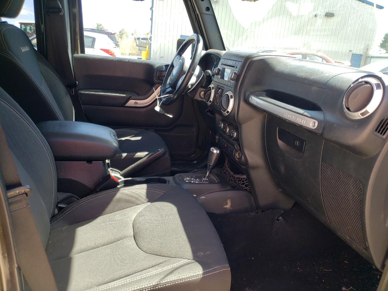 Photo 5 from auction – 2016 JEEP WRANGLER U with VIN 1C4BJWEGXGL116894