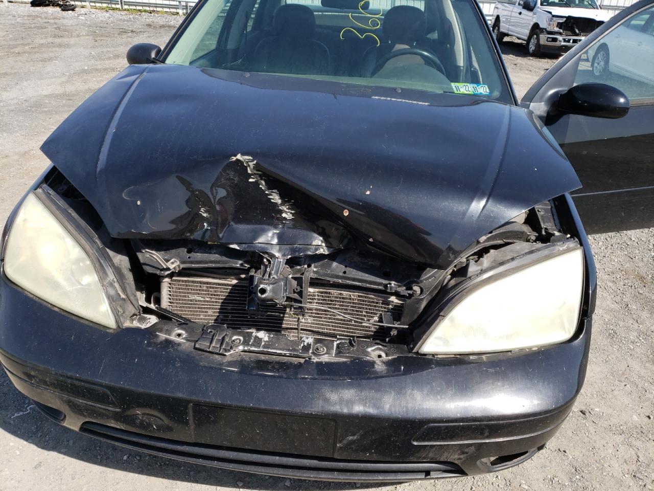 Photo 7 from auction – 2005 FORD FOCUS ZX4 with VIN 1FAFP38Z55W202420