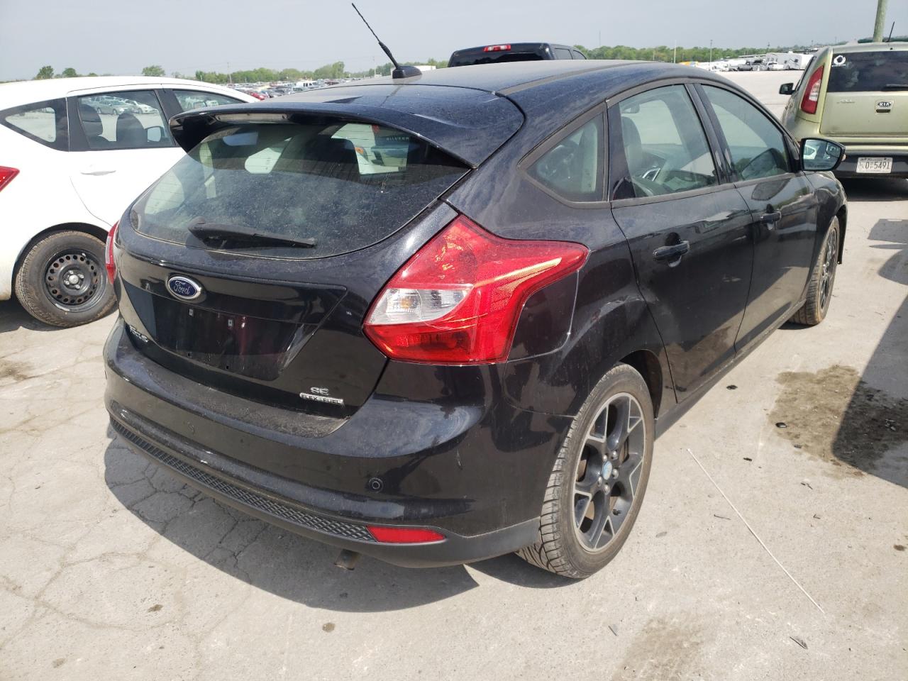 Photo 4 from auction – 2013 FORD FOCUS SE with VIN 1FADP3K21DL224997