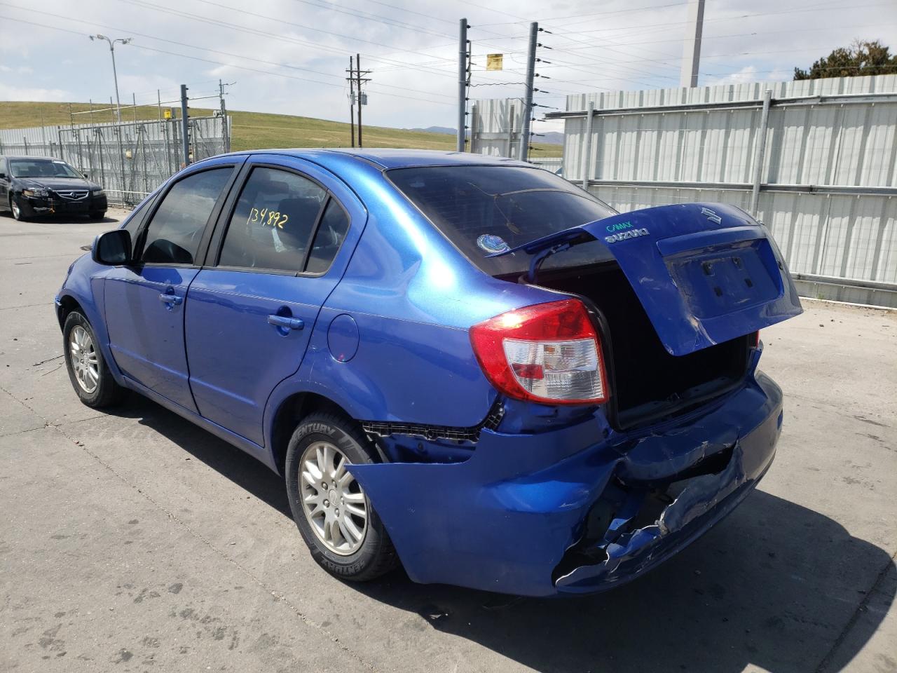 Photo 3 from auction – 2012 SUZUKI SX4 LE with VIN JS2YC5A35C6305131