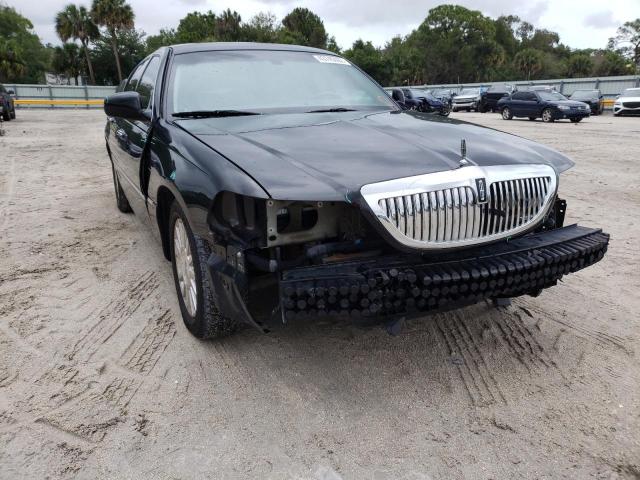 Photo 9 from auction – 2004 LINCOLN TOWN CAR U with VIN 1LNHM83W34Y653978
