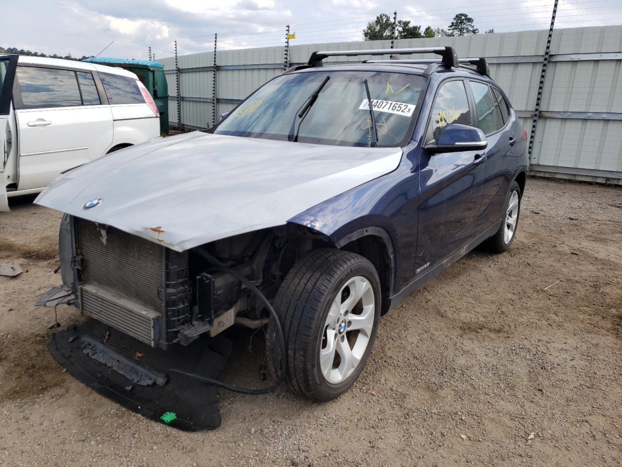 Photo 2 from auction – 2013 BMW X1 SDRIVE2 with VIN WBAVM1C54DVW44050