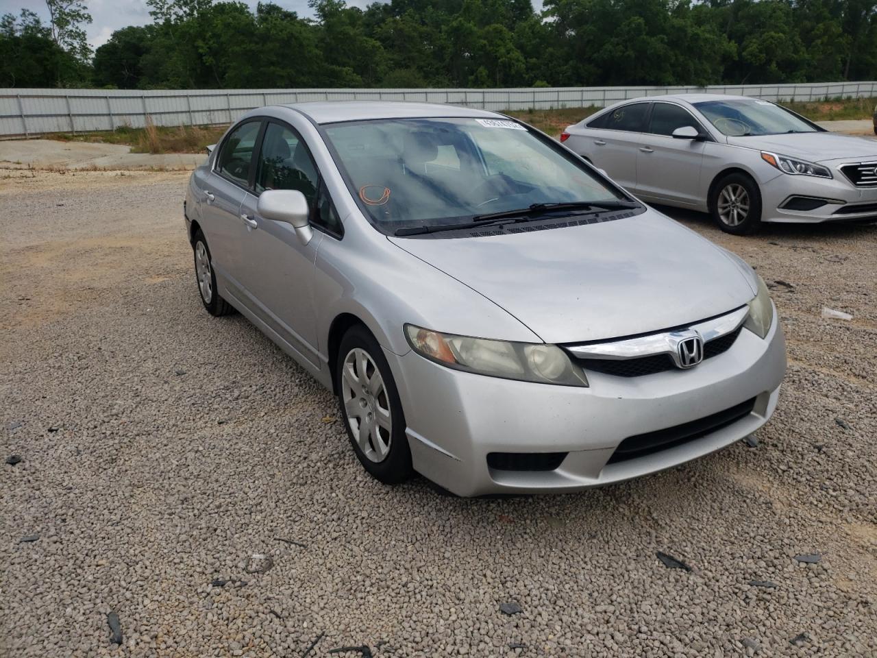 HONDA CIVIC LX 2011 with VIN 19XFA1F52BE012712 - Photo from auction
