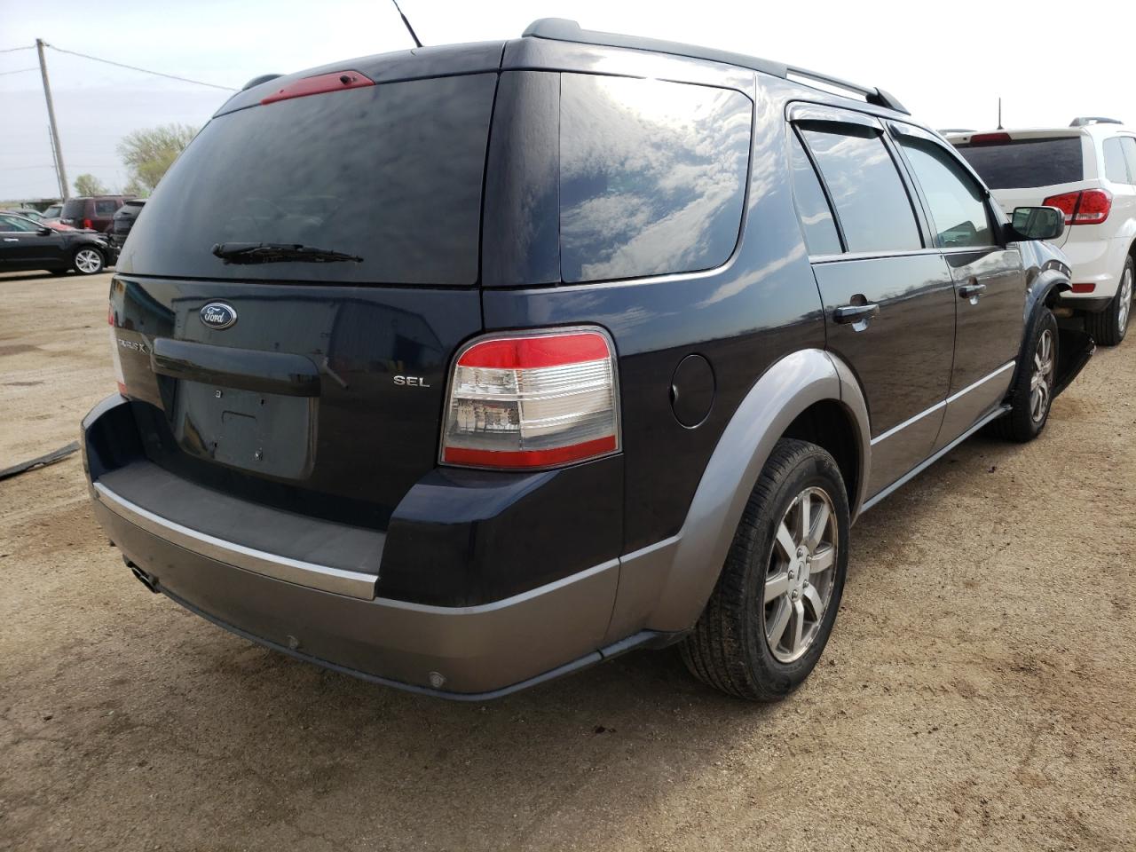 Photo 4 from auction – 2008 FORD TAURUS X S with VIN 1FMDK02W48GA45793