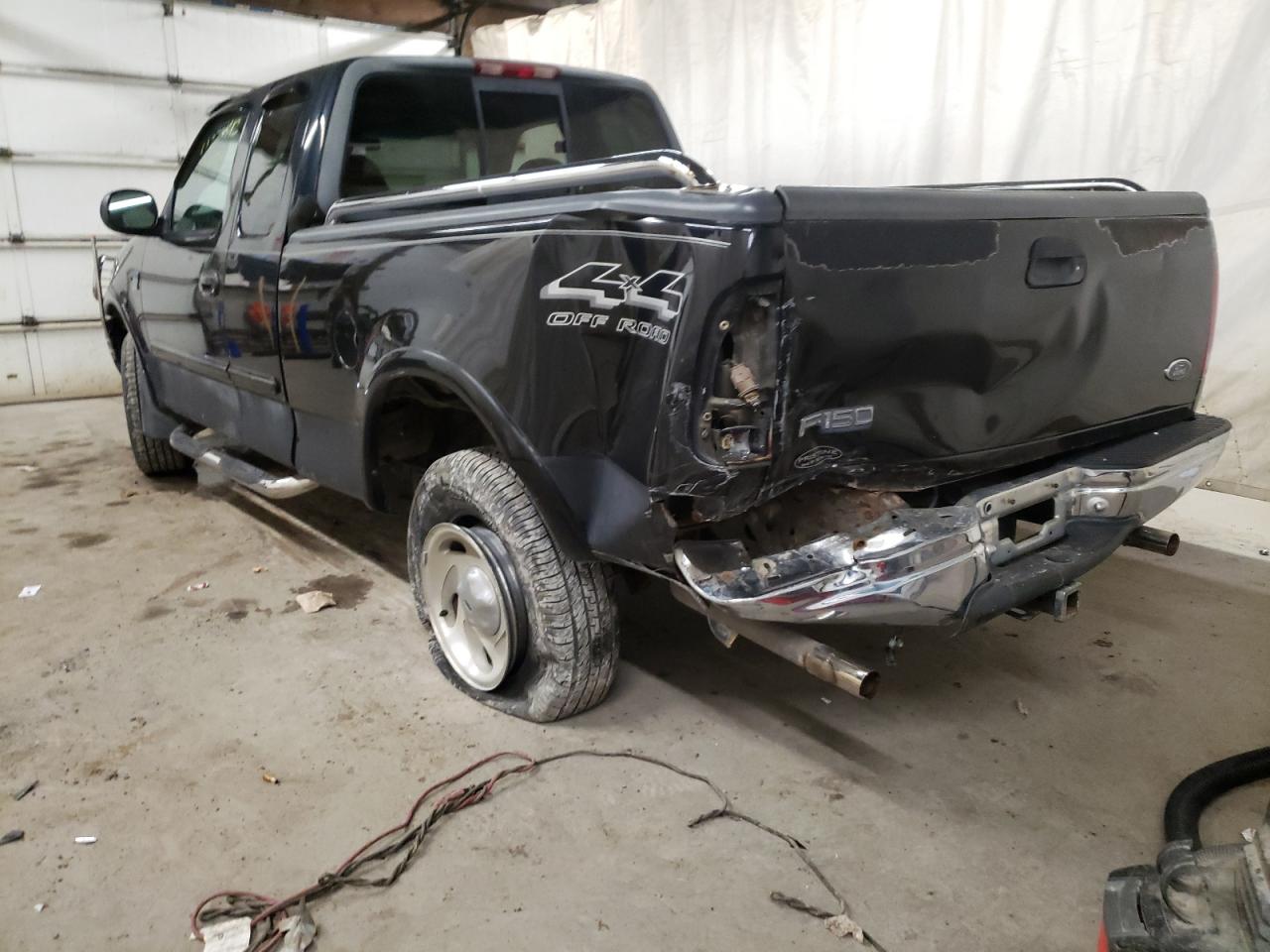 Photo 3 from auction – 2000 FORD F150 with VIN 1FTRX18L7YNA70536