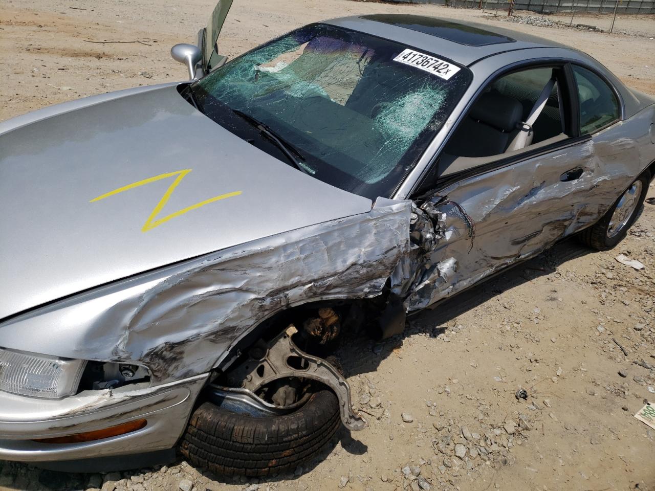 Photo 9 from auction – 1999 BUICK RIVIERA with VIN 1G4GD2214X4701952