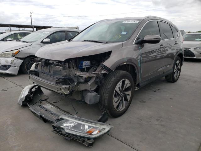 Photo 2 from auction – 2015 HONDA CR-V TOURI with VIN 5J6RM3H95FL019290