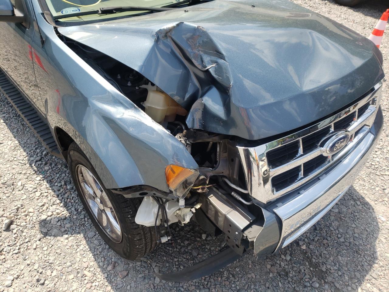 Photo 9 from auction – 2012 FORD ESCAPE LIM with VIN 1FMCU0EG9CKB75181