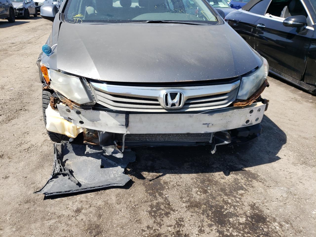 Photo 9 from auction – 2012 HONDA CIVIC LX with VIN 2HGFB2F41CH105030