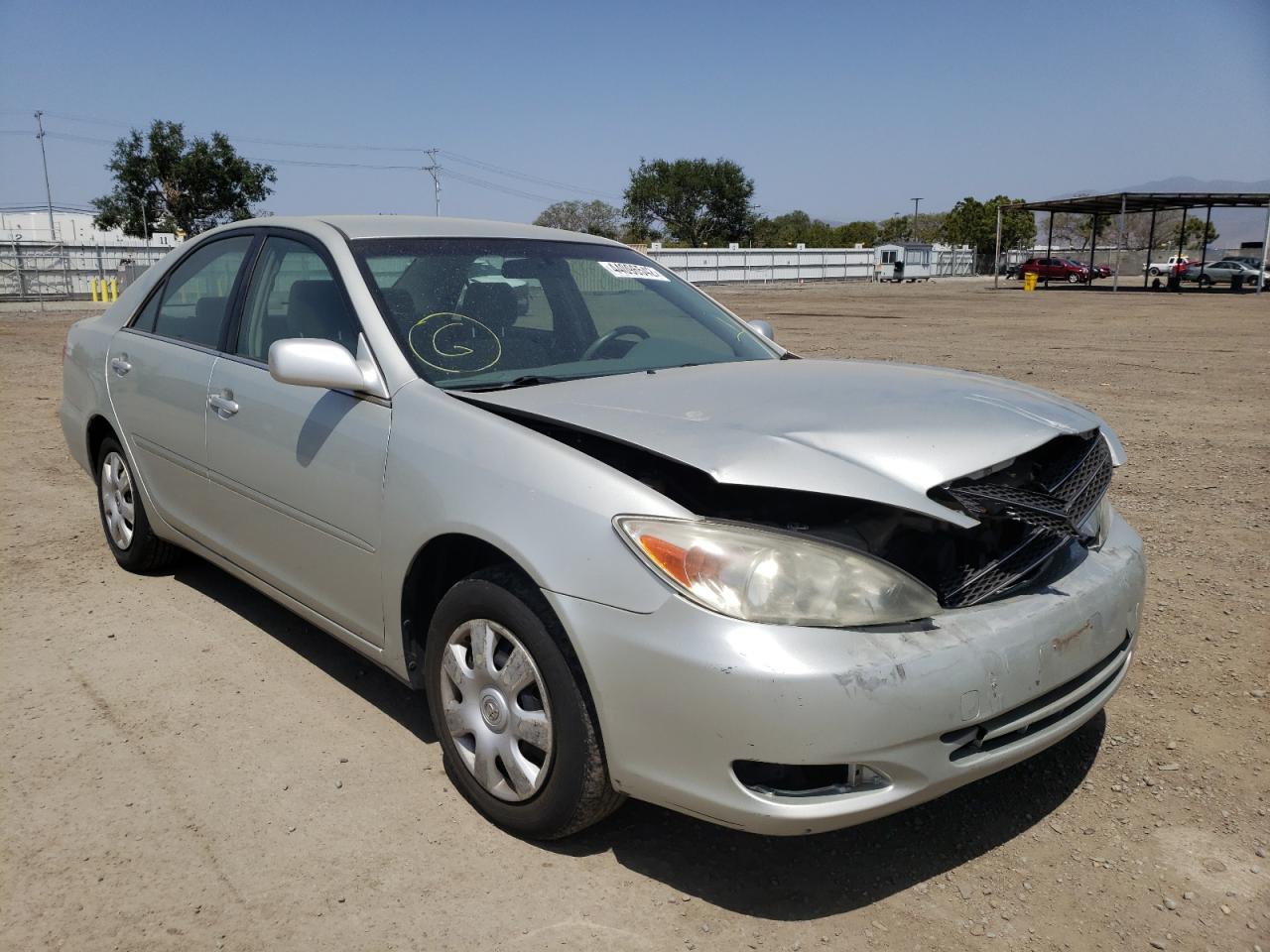 TOYOTA CAMRY LE 2002 with VIN JTDBE32KX20129991 - Photo from auction