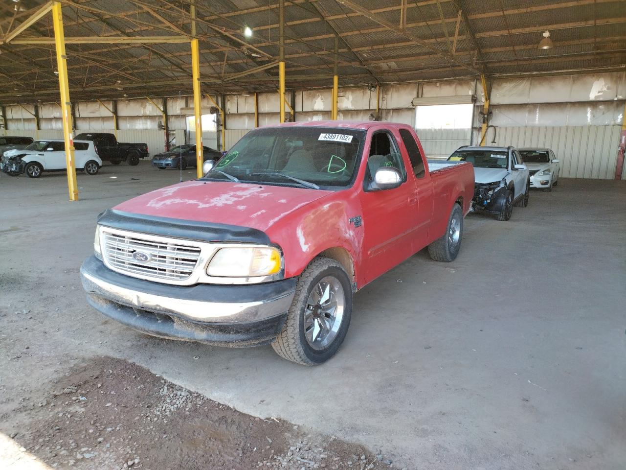 Photo 2 from auction – 1999 FORD F150 with VIN 1FTRX17W3XKB05052