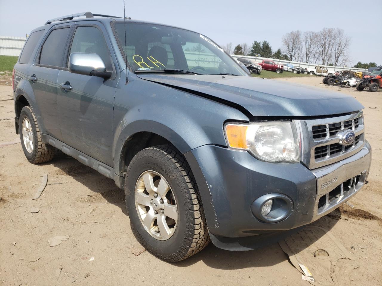FORD ESCAPE LIM 2011 with VIN 1FMCU0EGXBKB90108 - Photo from auction