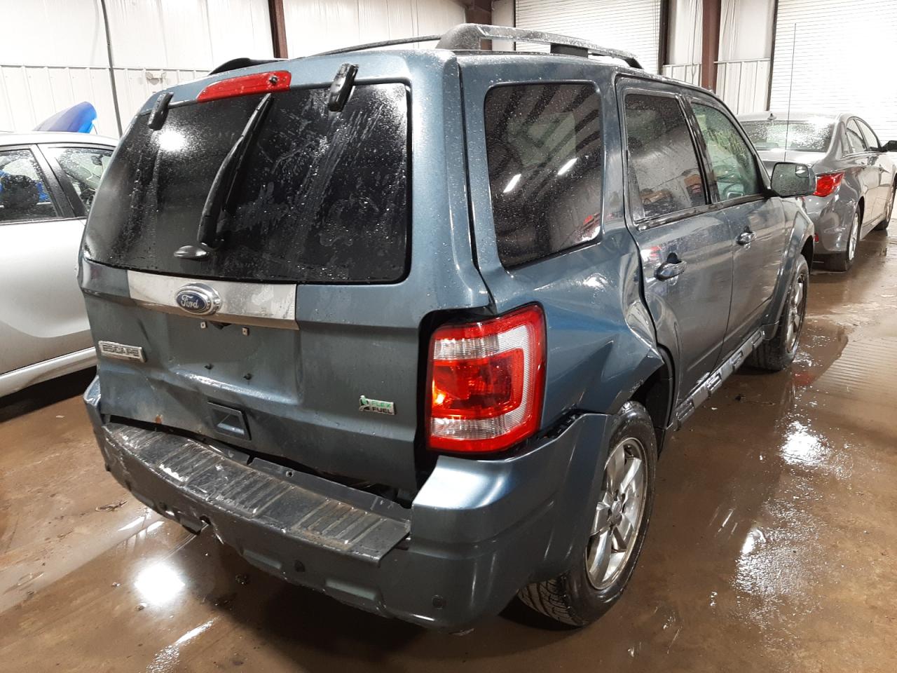 Photo 4 from auction – 2012 FORD ESCAPE LIM with VIN 1FMCU9EG6CKC23241