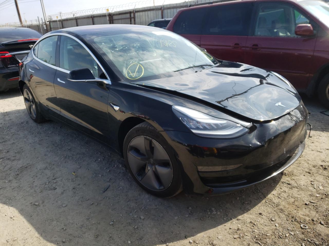 TESLA MODEL 3 2018 with VIN 5YJ3E1EA7JF173409 - Photo from auction