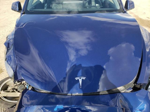 Photo 7 from auction – 2022 TESLA MODEL Y with VIN 7SAYGAEEXNF348022
