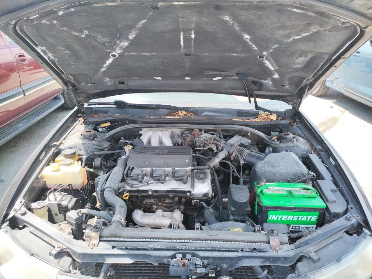 Photo 7 from auction – 2000 TOYOTA CAMRY SOLA with VIN 2T1CF22P7YC300072