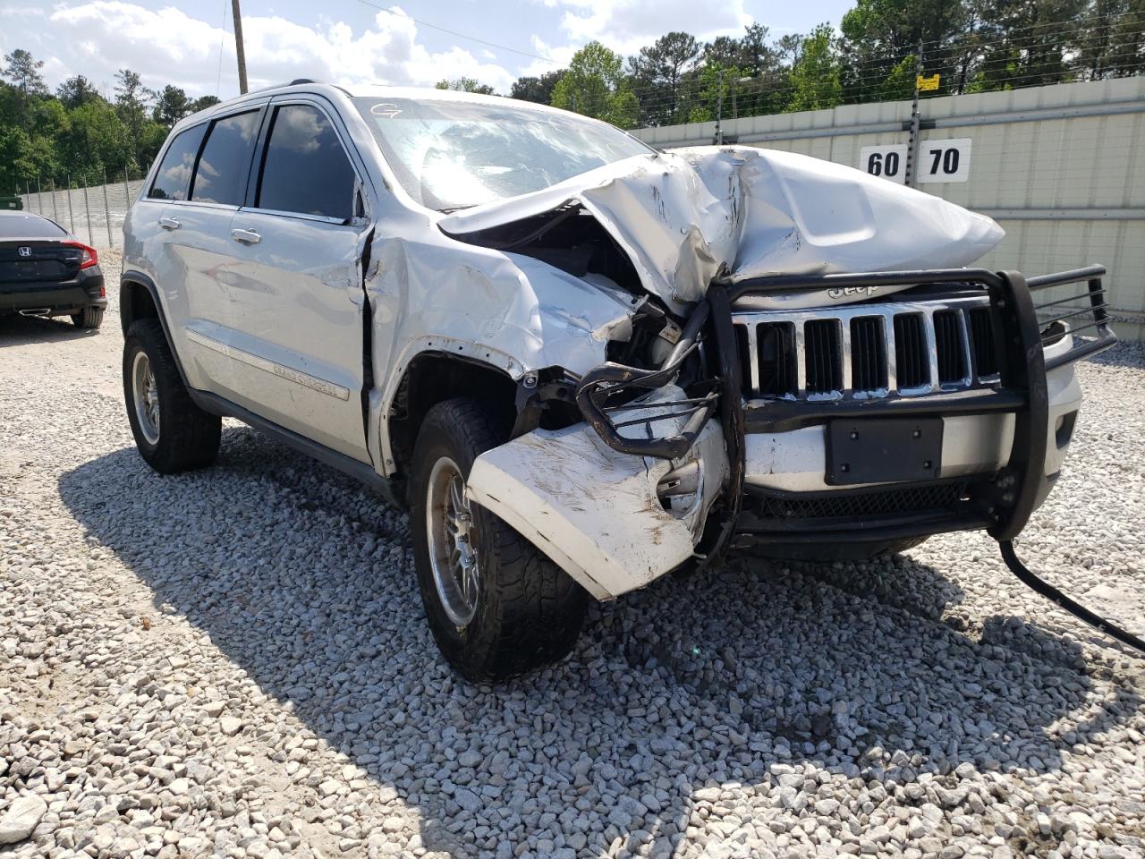 JEEP GRAND CHER 2012 with VIN 1C4RJFAG3CC325991 - Photo from auction