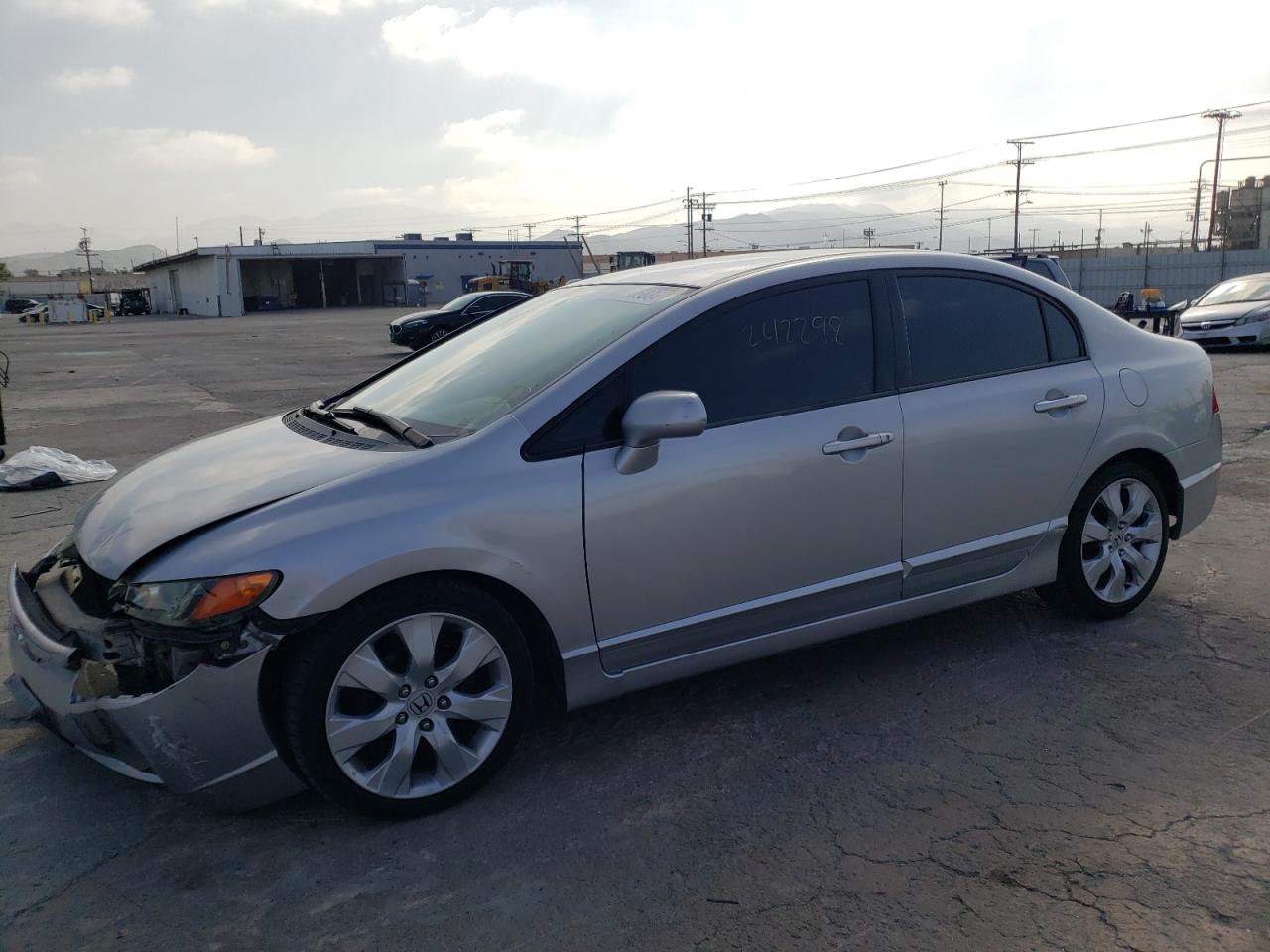 Photo 2 from auction – 2007 HONDA CIVIC LX with VIN 1HGFA16547L005146