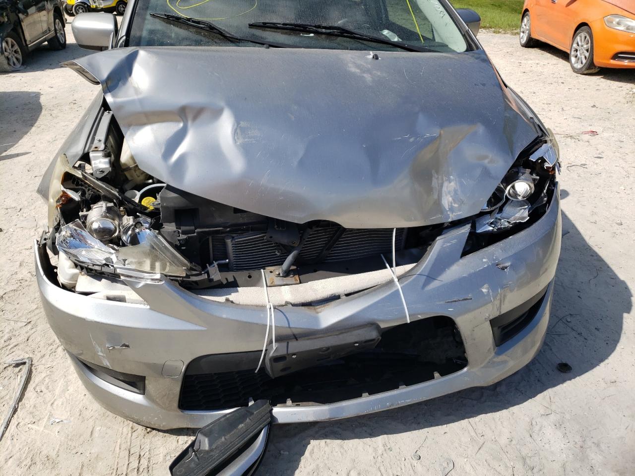 Photo 20 from auction – 2010 MAZDA 5 with VIN JM1CR2W3XA0380319