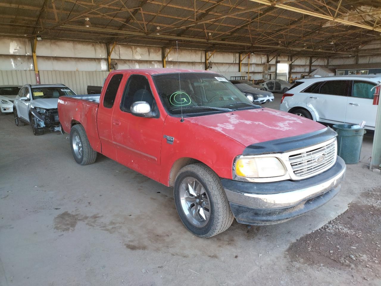 FORD F150 1999 with VIN 1FTRX17W3XKB05052 - Photo from auction